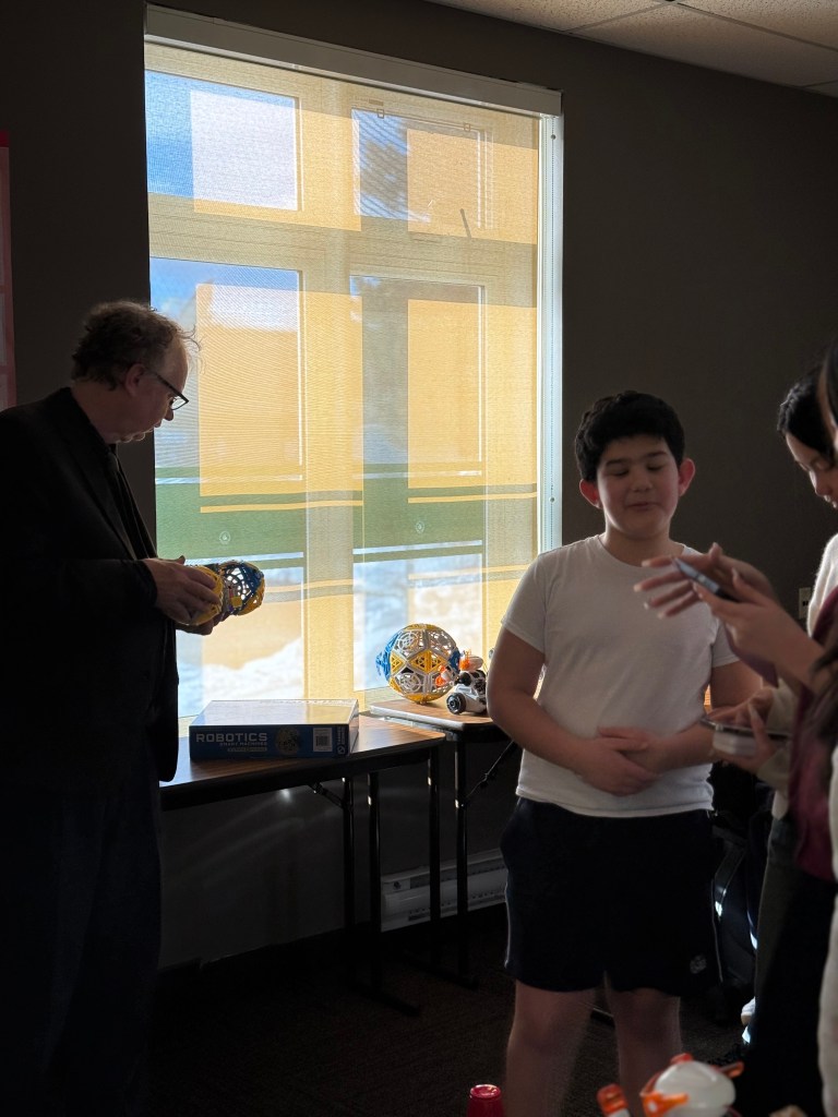 GCS Science Club students researching robotics artificial intelligence and AP Computer Science concepts